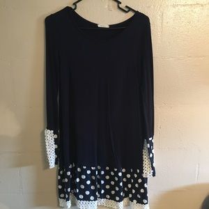 navy dressy top with white polka dots